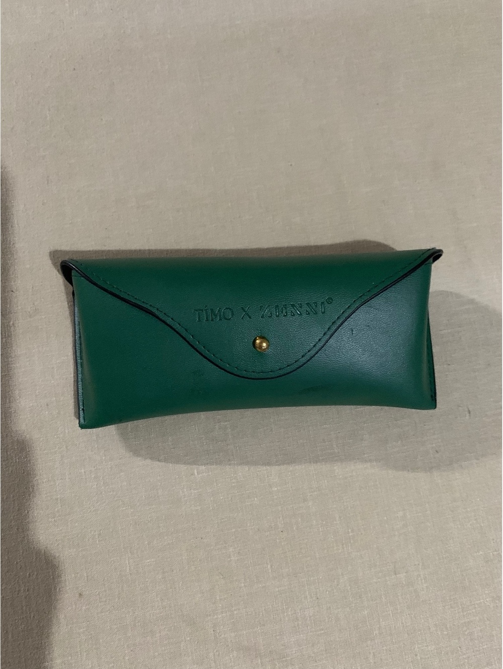 Tino Xzany green eyeglasses case